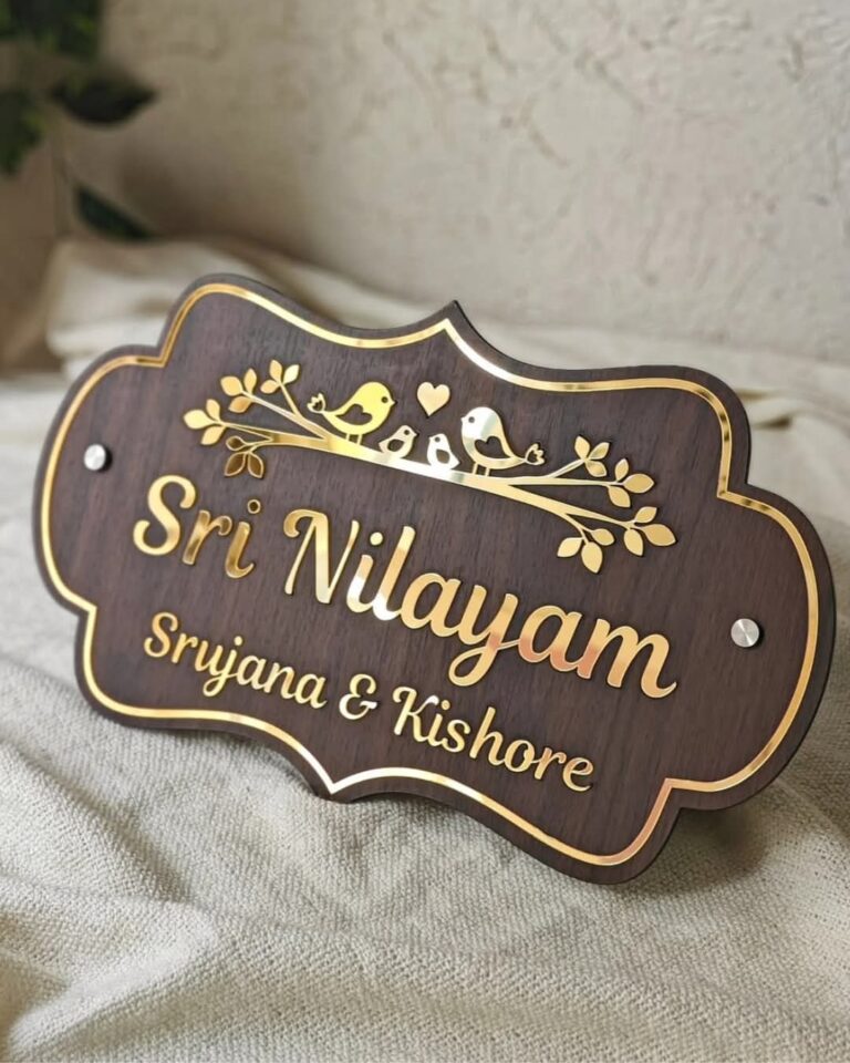 Wooden name plate with gold acrylic letters and birds