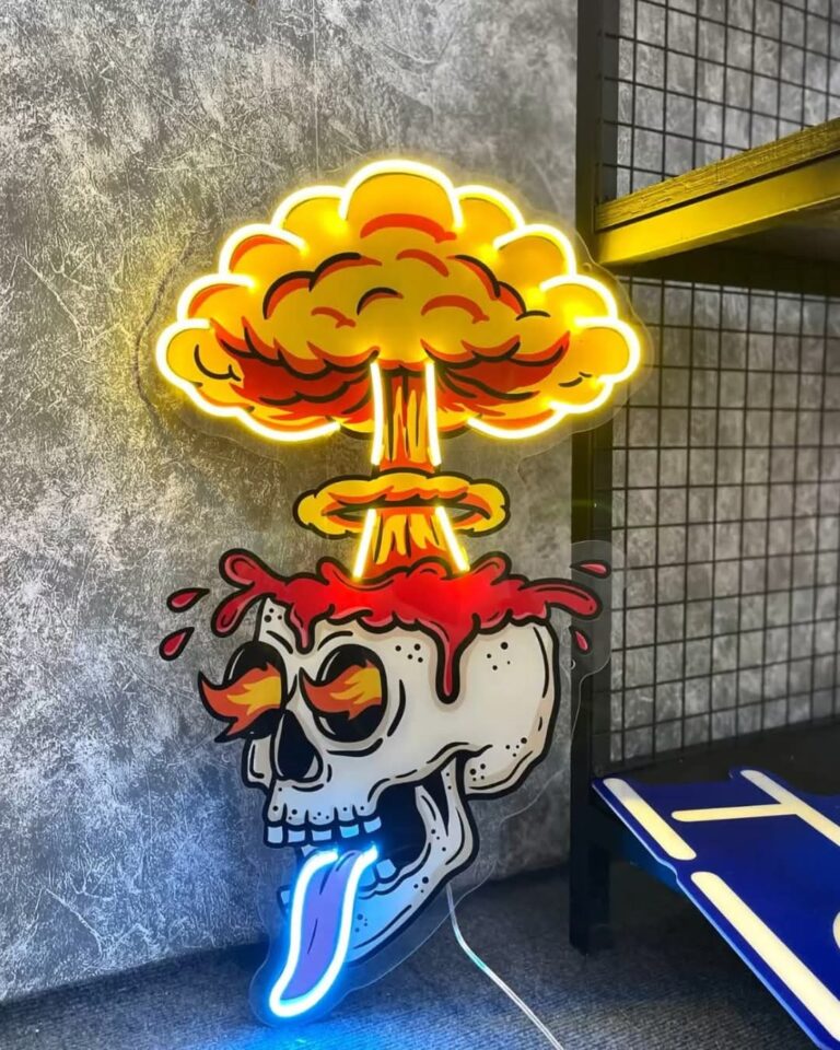 Printed neon art board of a skull with mushroom cloud
